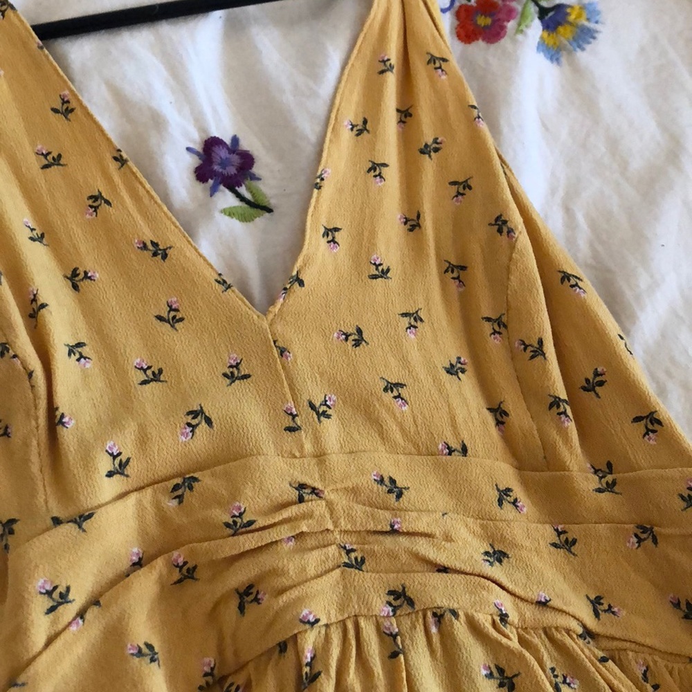 American Eagle yellow floral halter flowy top.